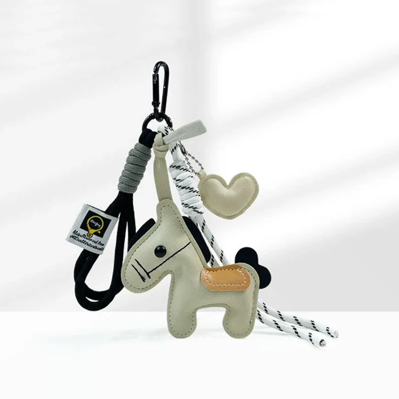 porte-clés en corde tressée avec pendentif en cuir motif cheval, accessoire de mode pour sacs à main, sacs à dos et décoration de clés de voiture