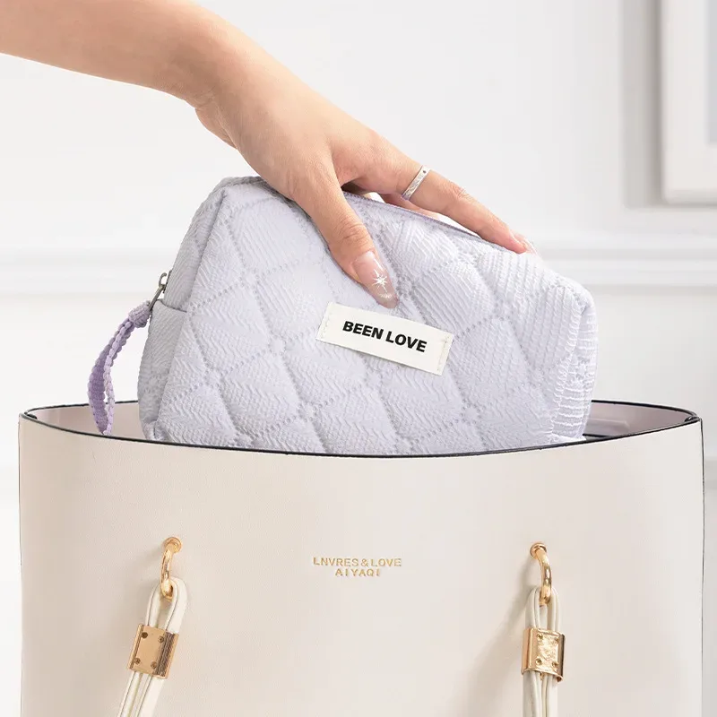 nouveau sac de rangement octogonal pour maquillage, pochette de voyage, sac de rangement de couleur unie, grande capacité, sac cosmétique haut de gamme.