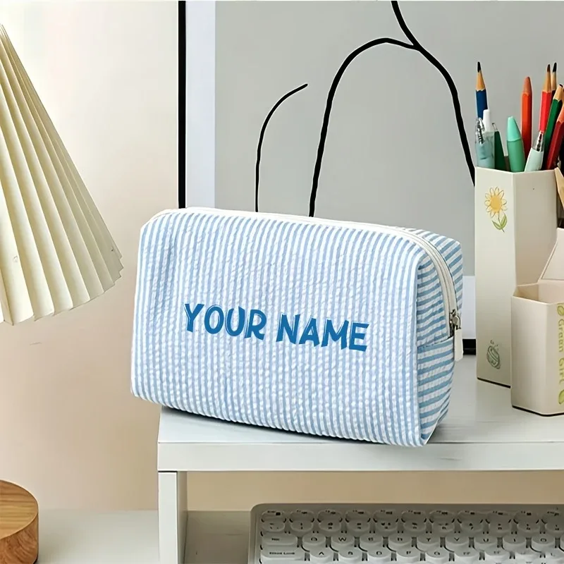 pochette à maquillage personnalisée à rayures verticales décontractées, pochette de rangement élégante et simple en tissu seersucker, sac de voyage léger et spacieux pour cosmétiques