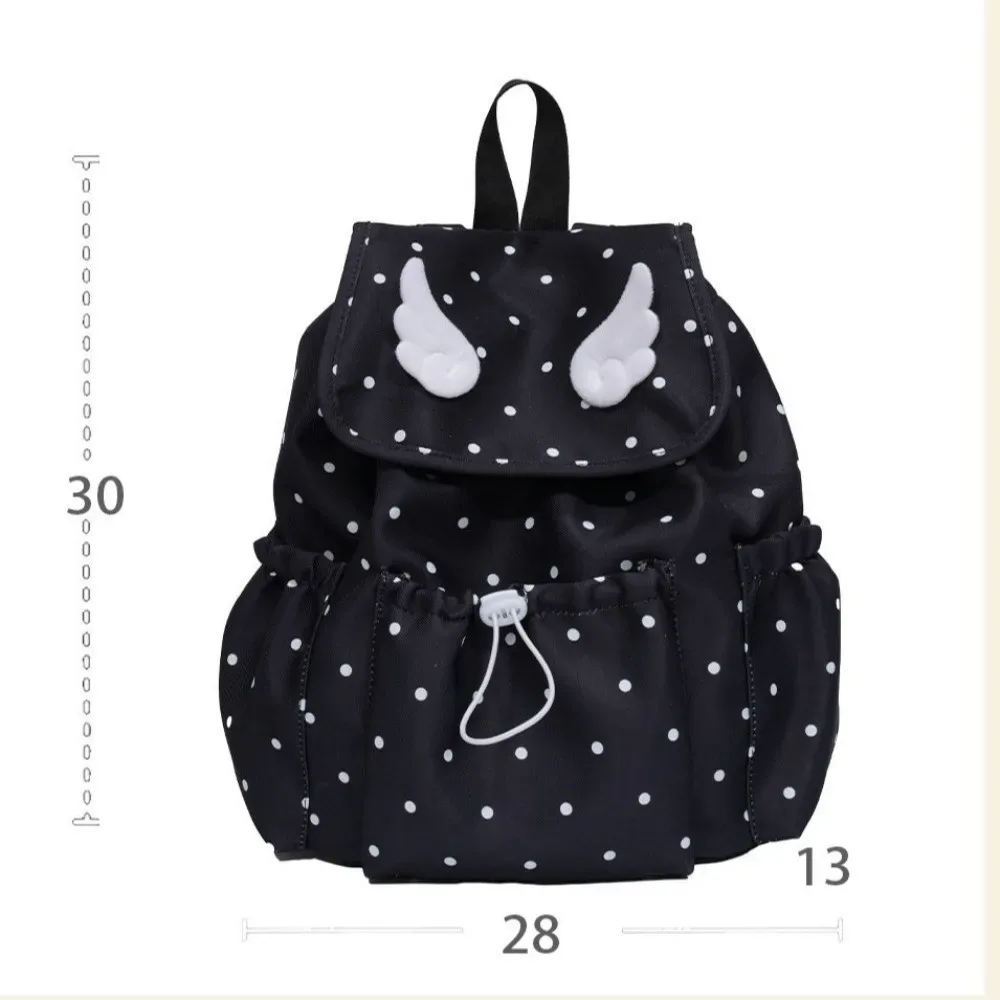 sac à dos à cordon de serrage imprimé à pois, fermeture à cordon, design à rabat, sac à dos pour livres, décor ailes d'ange, style décontracté