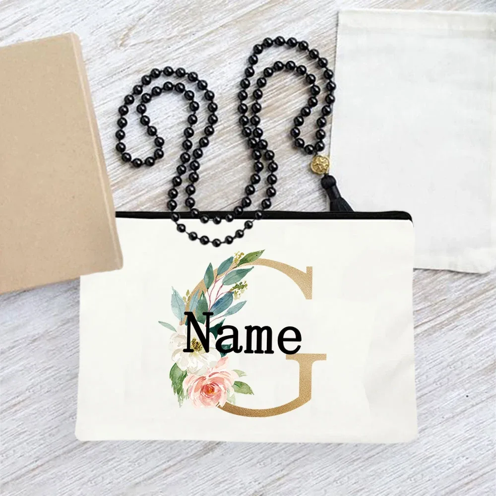 pochette en toile personnalisée avec initiales florales dorées, trousse de toilette légère personnalisée avec monogramme pour femmes, idéale pour les voyages quotidiens.