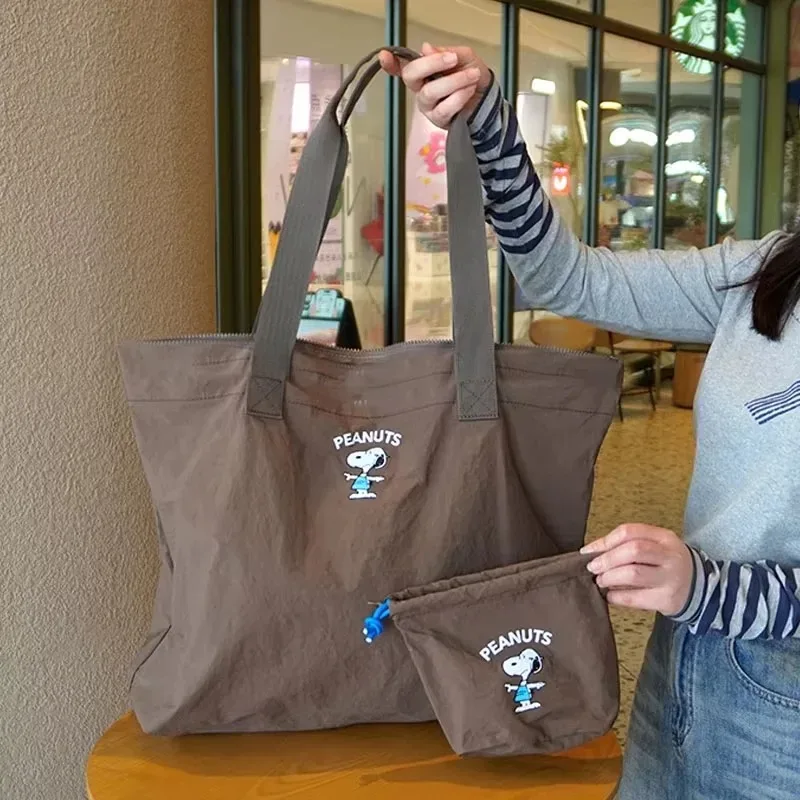 Sac de voyage grande capacité Snoopy tendance et mignon, sac à bandoulière pour femme, sac de sport pliable