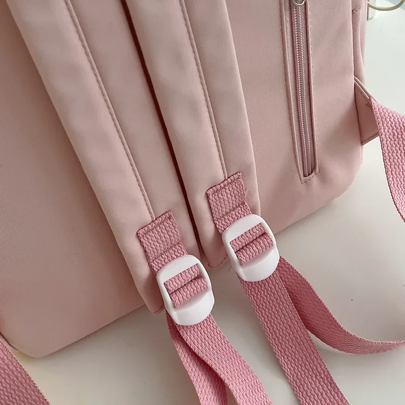 sac à dos rose mignon pour filles cartable à la mode décoré d'étoiles avec porte-clés en peluche parfait pour une utilisation quotidienne et l'école style adorable et tendance idéal pour adolescente