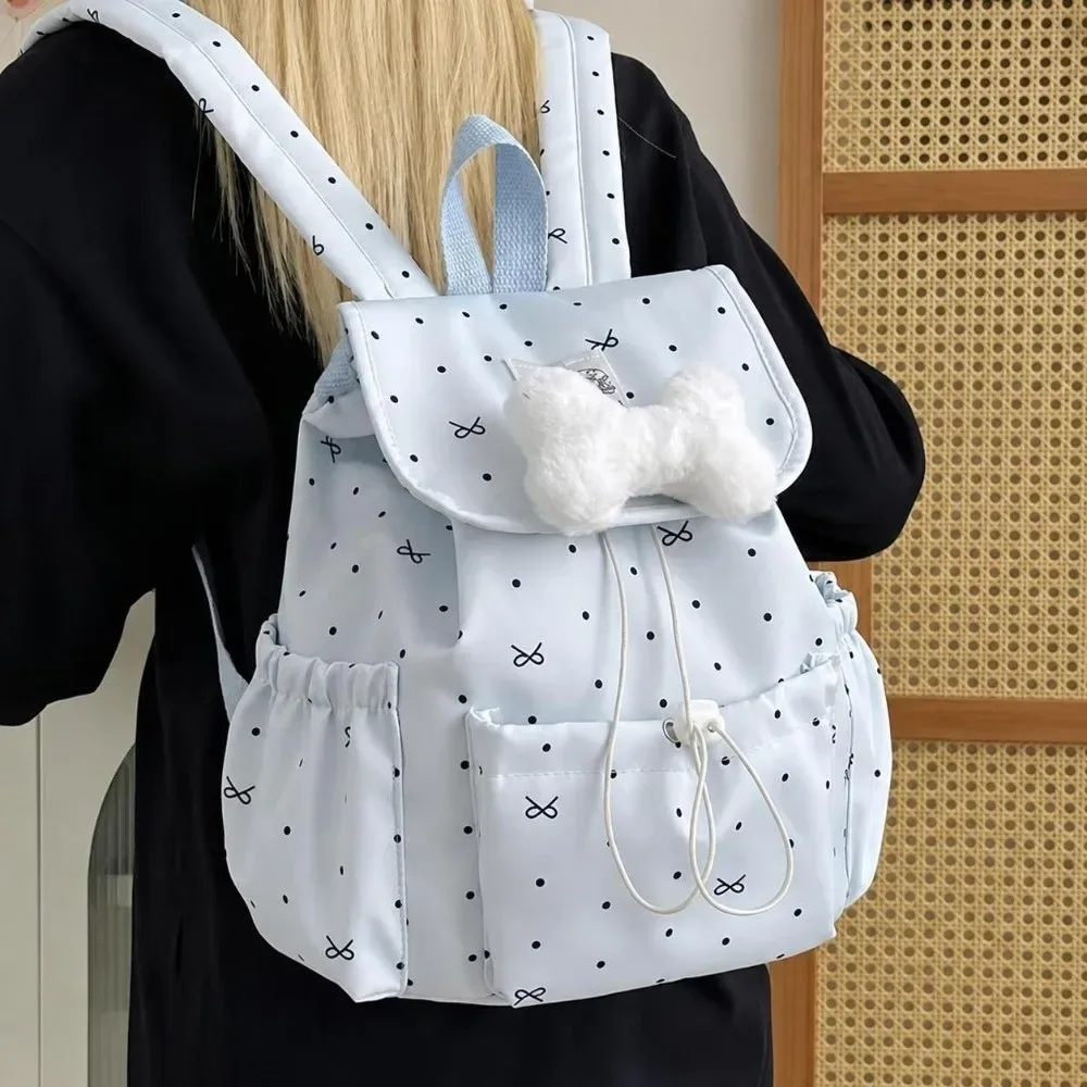 sac à dos à pois avec cordon de serrage, grande capacité, ultra léger, double bandoulière, en nylon, avec nœud, idéal pour les trajets quotidiens.