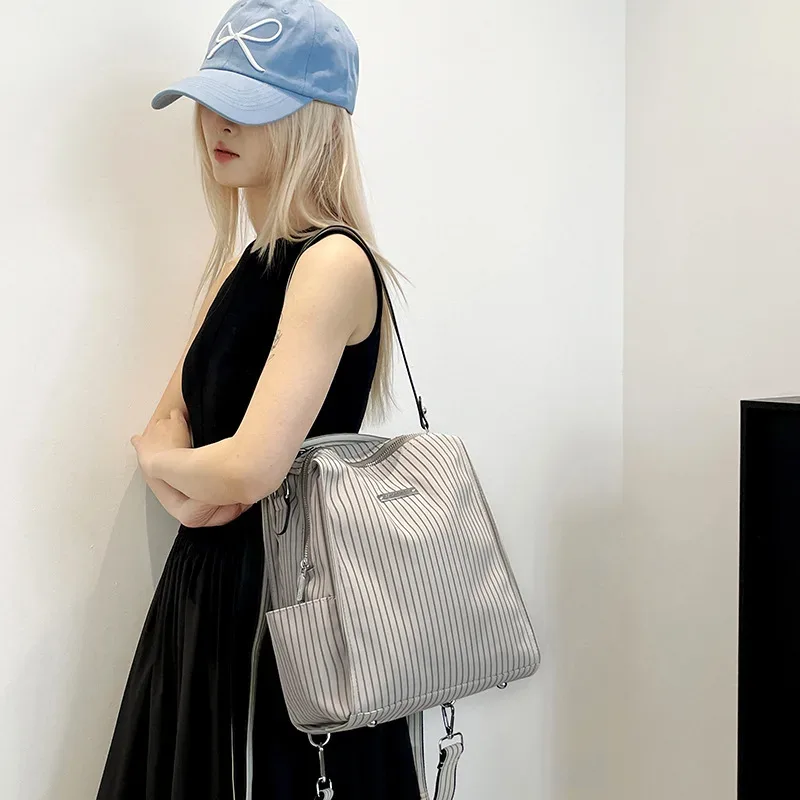 nouveau ins mode niche sac à dos simple épaule portable messager polyvalent multifonctionnel sac à dos