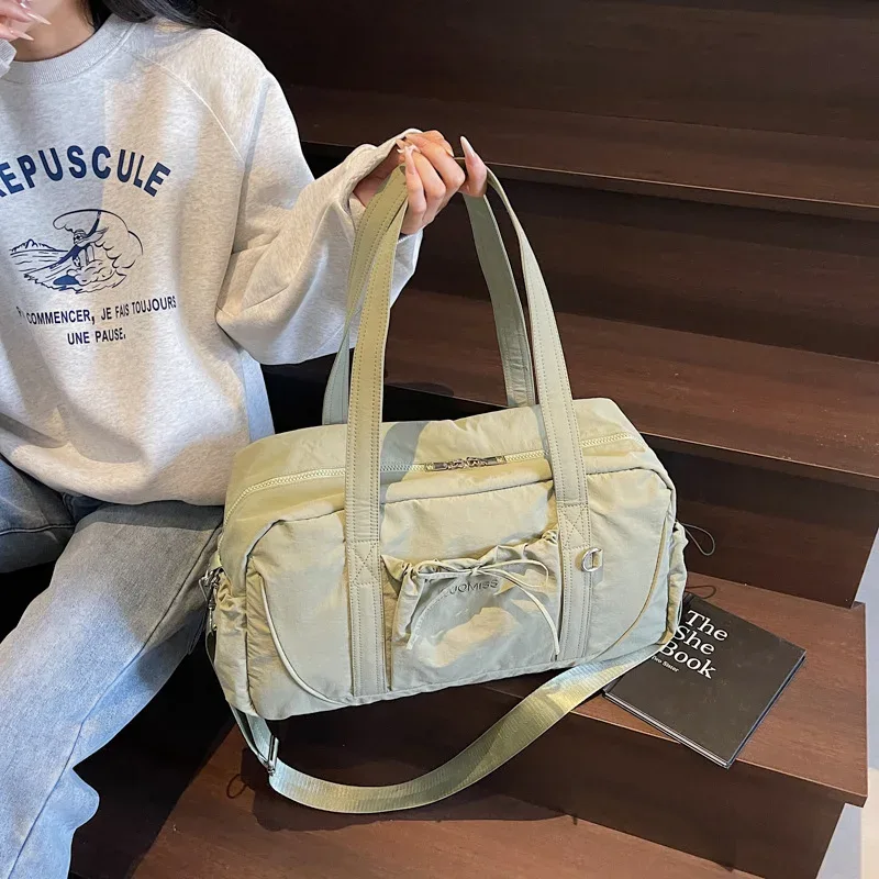 Nouveau sac de voyage grande capacité épaule Portable sac à bagages sac de rangement de voyage sacs d'embarquement sport Fitness sacs pour femmes сумка