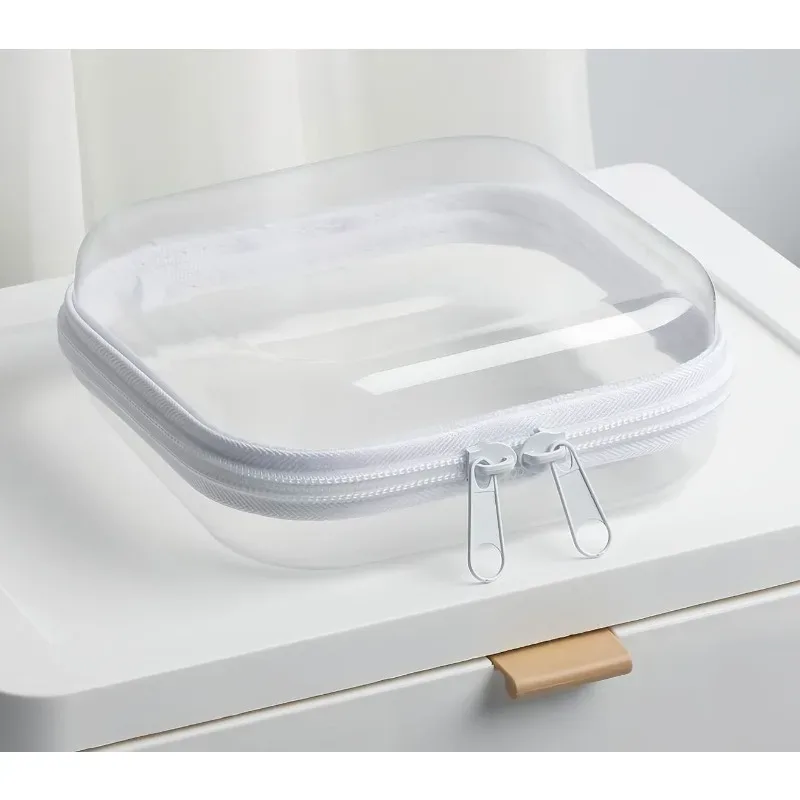 Best-seller Amazon : Mini trousse de rangement rigide transparente pour voyage, boîte organisatrice portable pour accessoires de voyage et petits cosmétiques