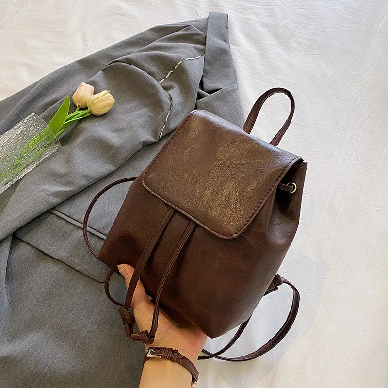 sac à dos à rabat en cuir pu pour femmes, petit sac à dos d'école texturé à cordon de serrage, sacs de voyage à la mode pour filles