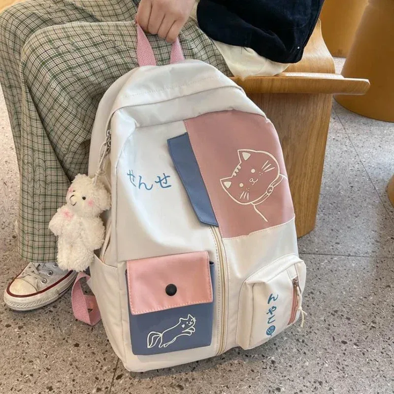 Sac à dos coréen mignon chat de dessin animé pour femmes, cartable pour lycéens, grande capacité, sac à dos de voyage étanche en Nylon