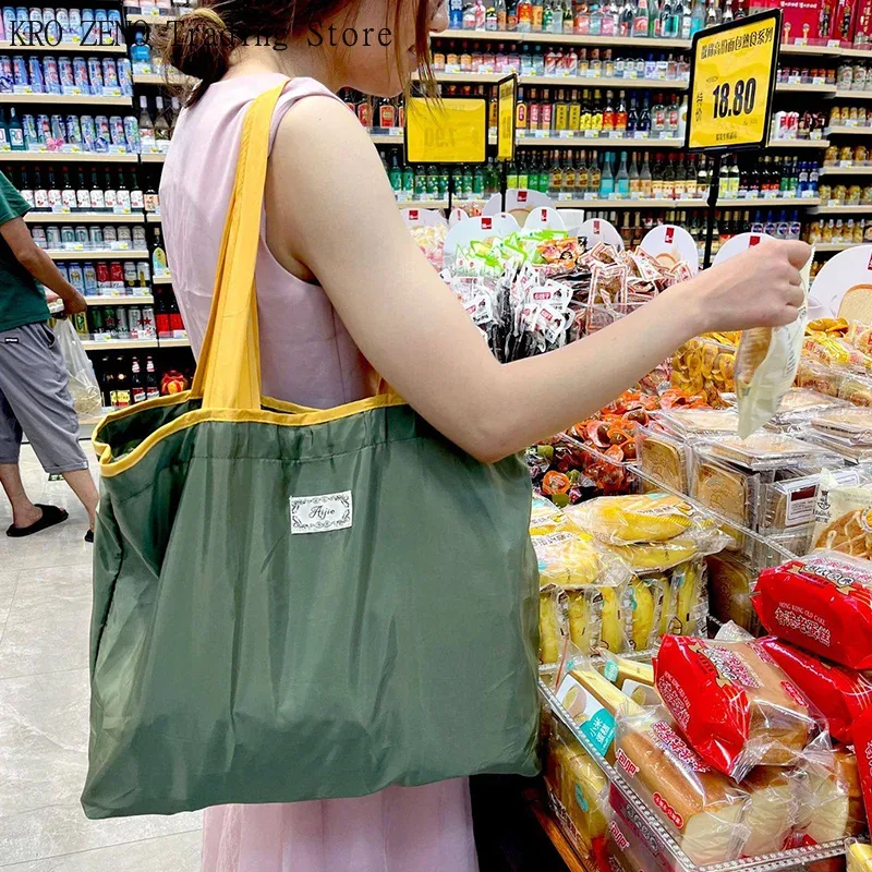 sac à bandoulière pliable imperméable de grande capacité, 1 pièce, sac de shopping de grande capacité, sac de rangement à la mode