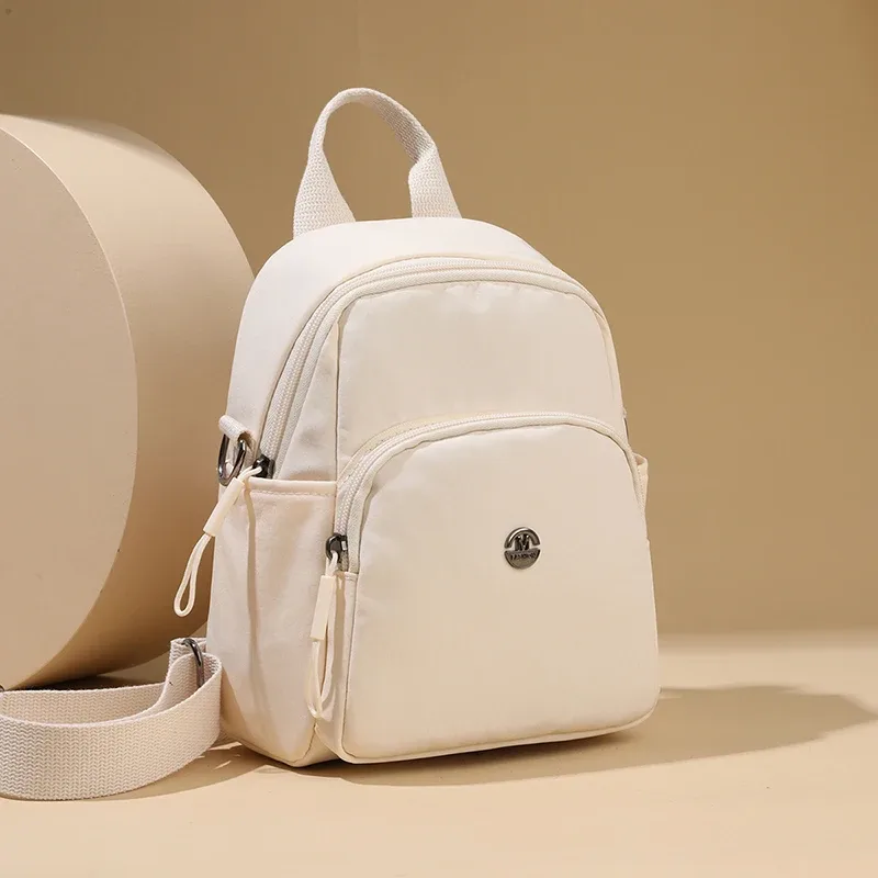 petit sac à dos léger de voyage décontracté pour femmes, sac à bandoulière en tissu imperméable de grande capacité et sensation haut de gamme pour filles, nouvelle collection