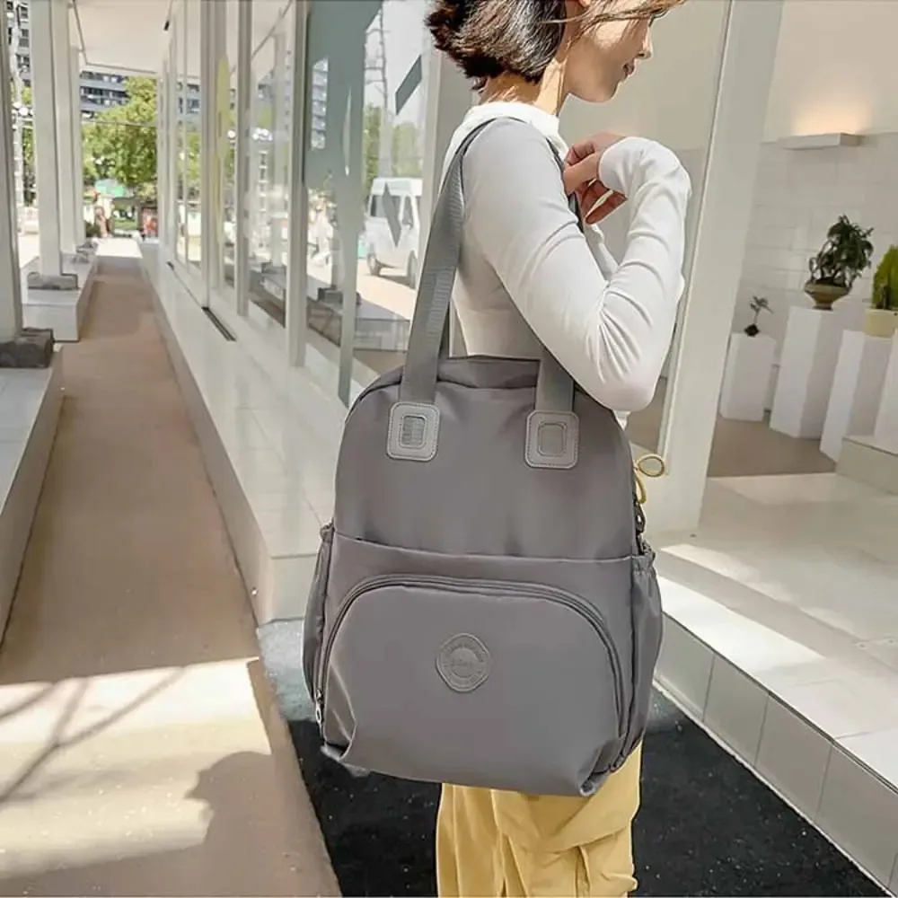sac à dos sportif décontracté en nylon de style coréen, couleur unie, grande capacité, sac de voyage, sac à bandoulière, sac fourre-tout, sac de fitness en nylon, sac de voyage