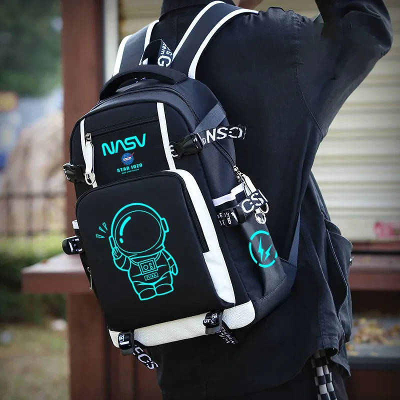 sac à dos d'étudiant spaceman imprimé fluorescent, sac à dos imperméable en tissu oxford avec bandoulière souple, sac de grande capacité à la mode