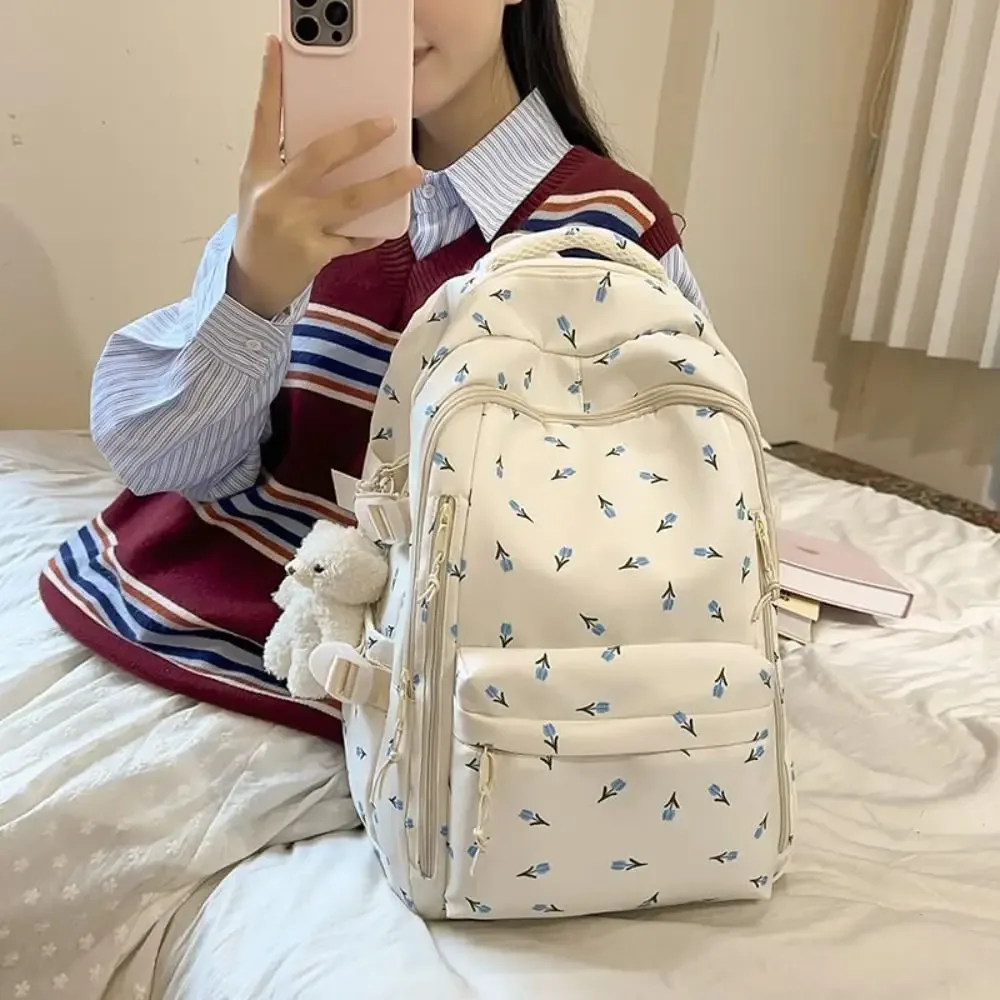 sac d'école en nylon pour étudiants, sac à dos de grande capacité de style preppy pour femmes avec pendentif, sac à dos de voyage à motif floral