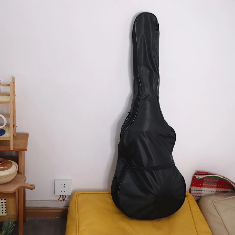 sac de guitare à bandoulière réglable épaisse en tissu oxford noir, sac à dos de guitare imperméable avec fermeture éclair, sac à bandoulière unique pour instruments.