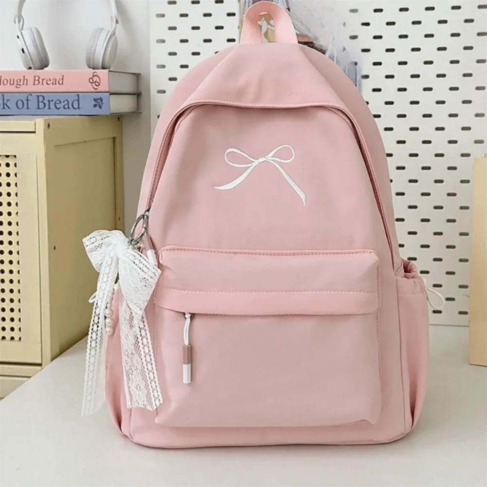 sac à dos pour filles avec nœud brodé, en nylon, grande capacité, léger, couleur unie, pour étudiants, sac d'école, sac de voyage