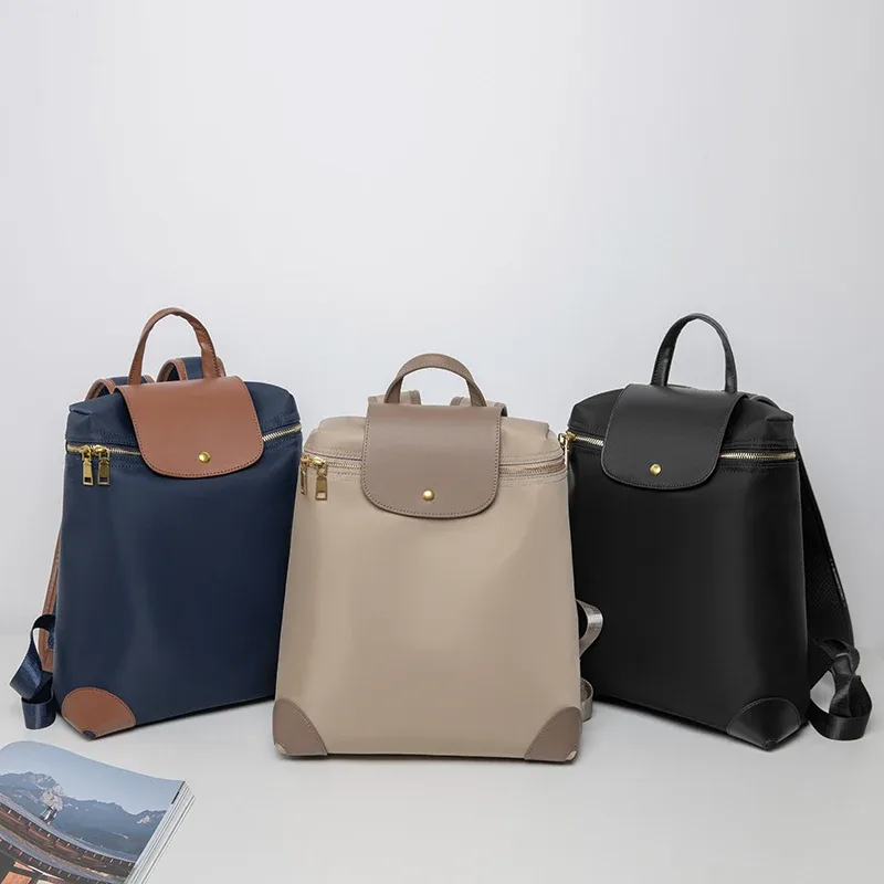 "sac à dos élégant de grande capacité pour femmes |   durable et résistant aux taches |   pliable léger |   sac à dos de voyage étanche"