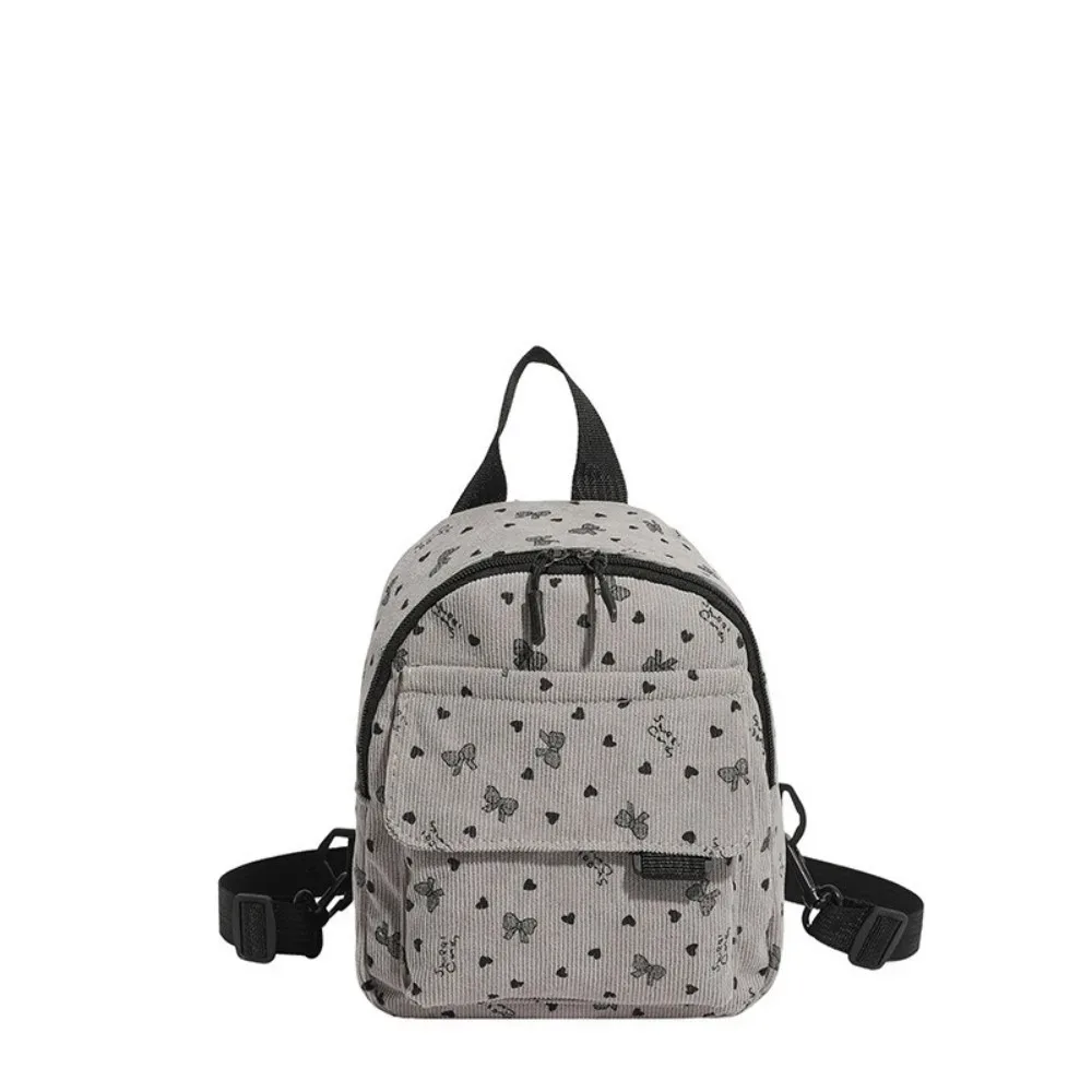 mini sac à dos en velours côtelé léger avec imprimé cœur et nœud, sac à dos décontracté multi-compartiments à ouverture zippée, sac à bandoulière de voyage