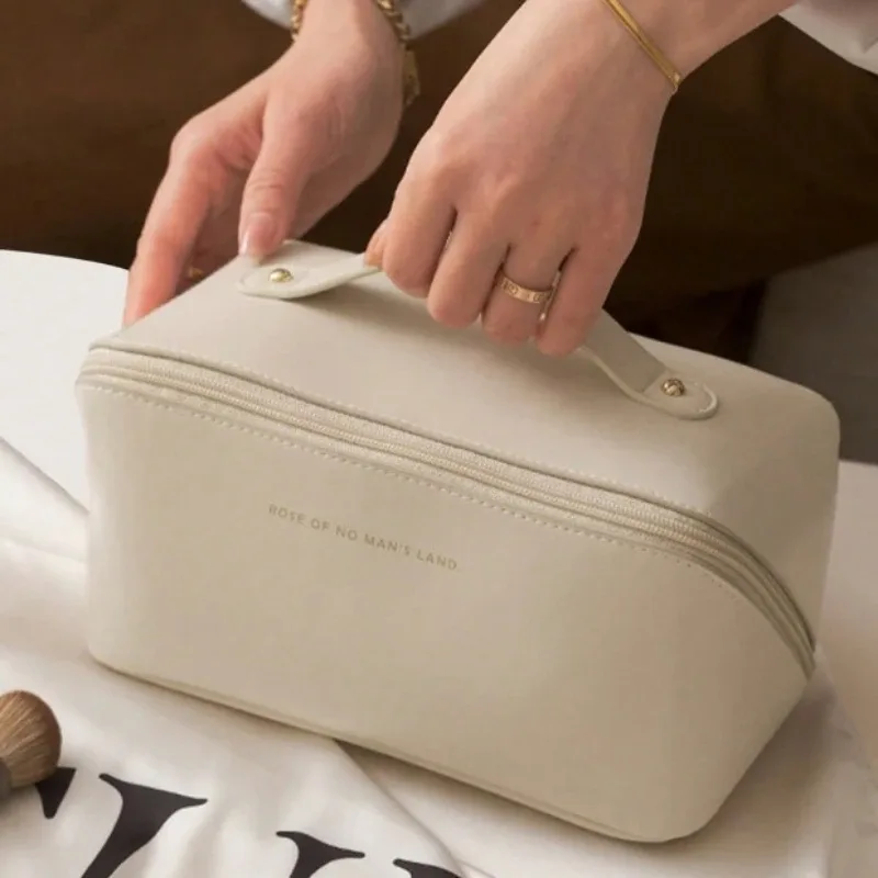 trousse de toilette grande capacité pour femme, sac de rangement portable pour maquillage avec séparateurs, poignée et fonction organisateur, sac à fermeture éclair