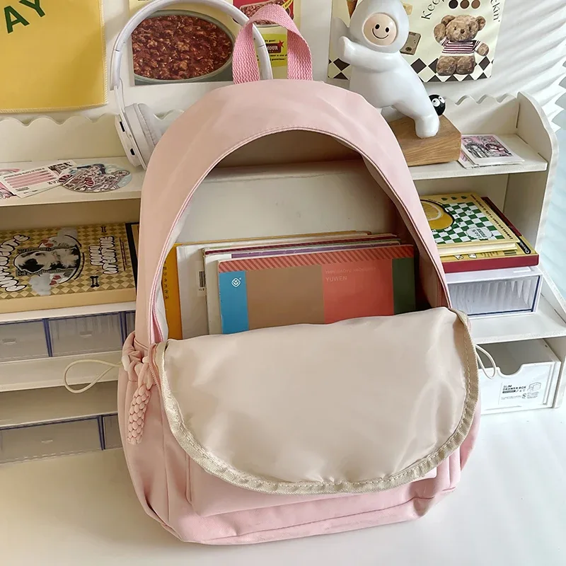 sac à dos rose mignon pour filles cartable à la mode décoré d'étoiles avec porte-clés en peluche parfait pour une utilisation quotidienne et l'école style adorable et tendance idéal pour adolescente