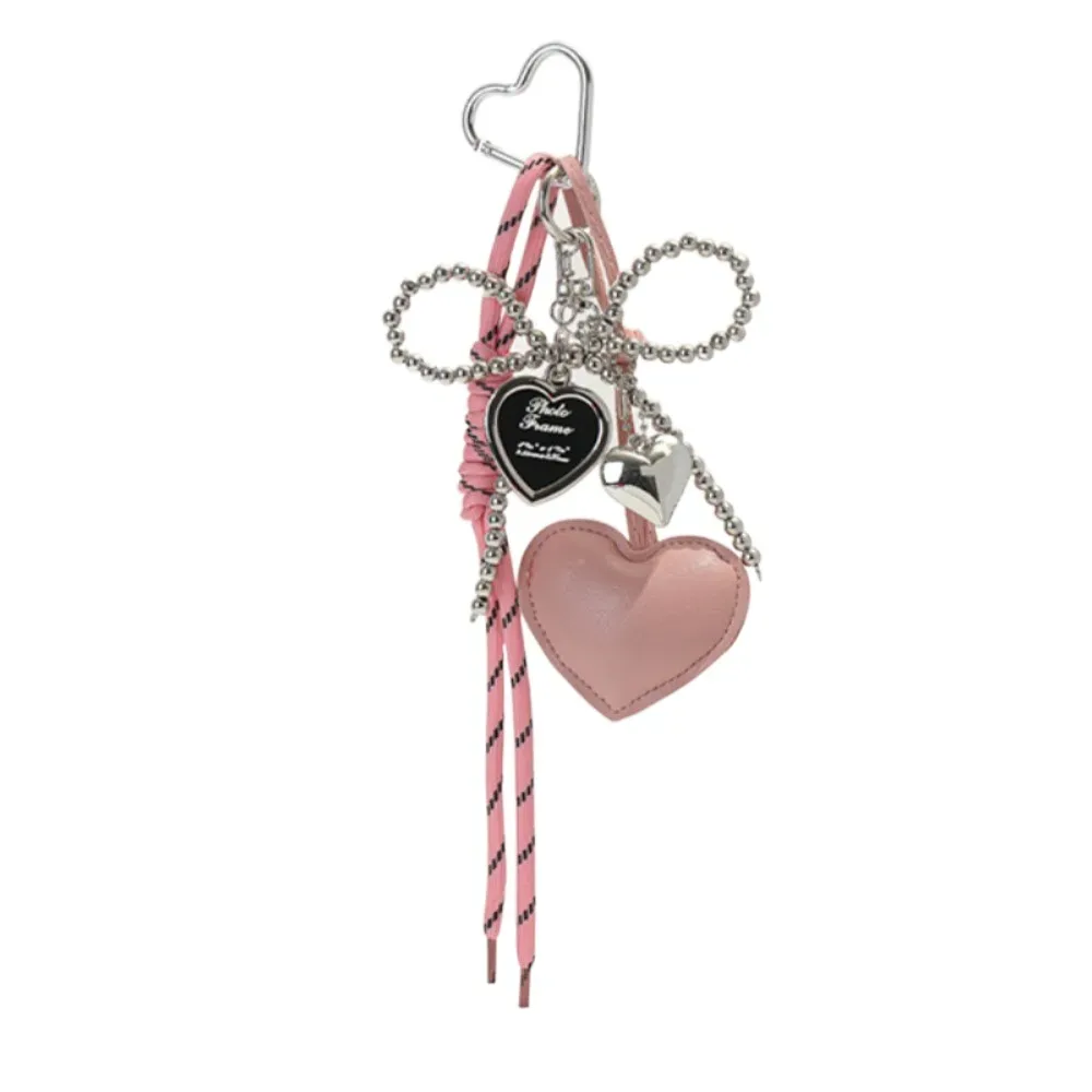 porte-clés créatif en cuir brillant avec nœud perlé, longue pampille, cœur d'amour, pendentif pour sac à dos, breloque de sac faite à la main, décoration pour sac à main quotidienne