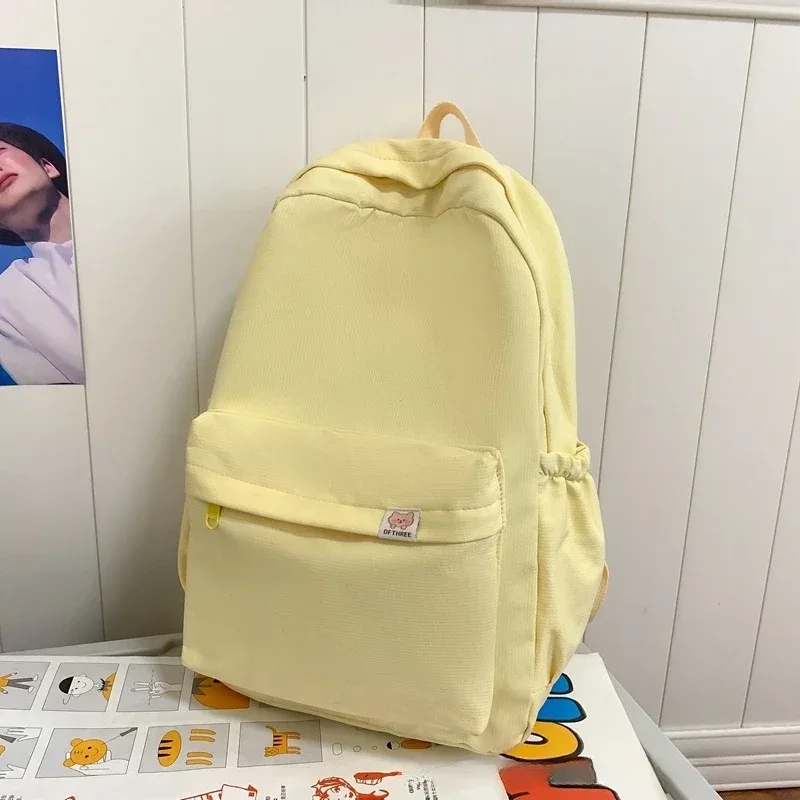 nouveau sac à dos imperméable en nylon pour femmes sac de voyage pour femmes sacs à dos cartable pour adolescentes couleur unie bookbag mochila bookbag