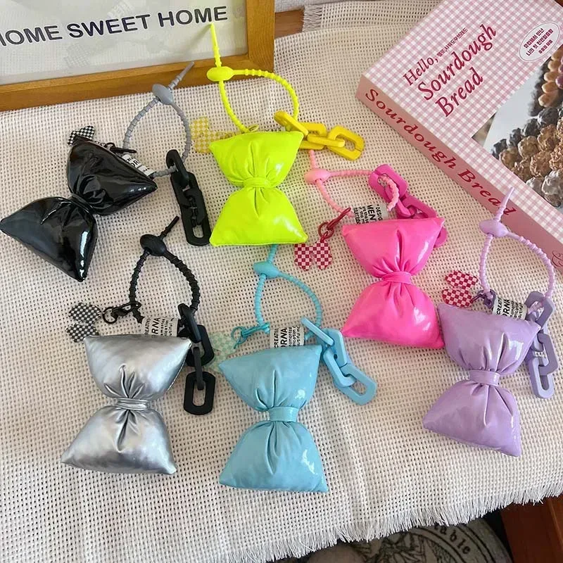 porte-clés en cuir et coton avec nœud doux pour fille, pendentif simple et mignon pour sac à dos, décoration de sacs