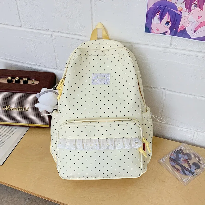 sac à dos tendance, sac d'école pour femmes à pois avec bordure en dentelle, mignon et élégant, sac à dos léger et de grande capacité pour étudiantes coréennes.