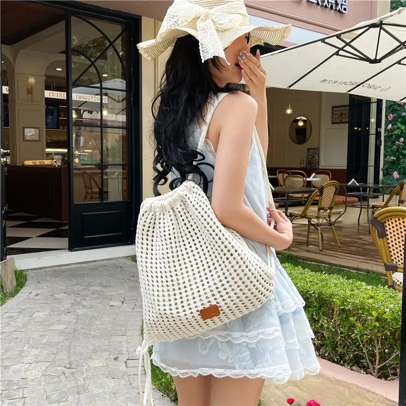 sac à cordon tissé tendance, grande capacité, design ajouré, sac à dos pratique pour les trajets quotidiens et le shopping
