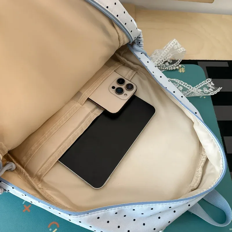 sac à dos scolaire en nylon de grande capacité, style coréen, orné de dentelle à pois et d'un joli nœud décoratif, idéal pour les filles, pour les voyages quotidiens.