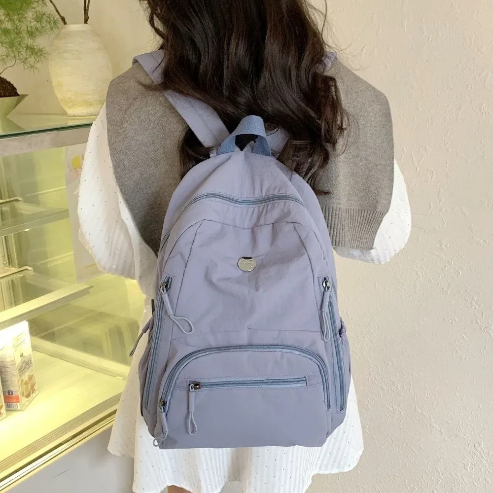 sac à dos décontracté en nylon grande capacité, léger et durable, pour l'école, les voyages, couleur unie, imperméable, pour ordinateur portable, idéal pour la gym
