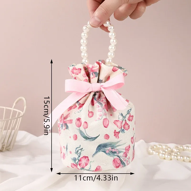 sac à cordon en toile florale, petite pochette à bijoux avec nœud papillon avec poignée en chaîne de perles, sac d'emballage de bonbons de mariage