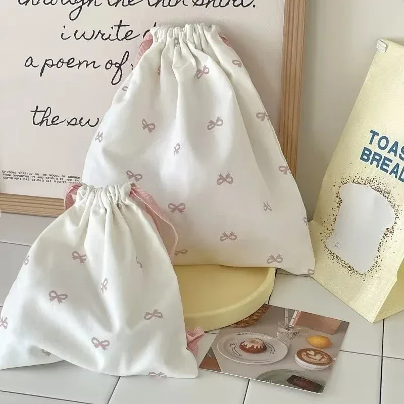sac de rangement coréen à cordon imprimé avec nœud mignon, sac à cosmétiques portable pour filles, organisateur de maquillage de voyage pour femmes, pochette à main