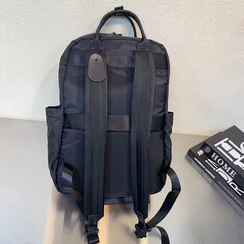 sac à dos en nylon de grande capacité, sac à dos de voyage multi-compartiments avec poignée pour les trajets quotidiens, l'école et les activités de plein air