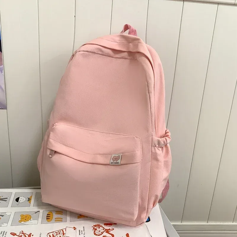 nouveau sac à dos imperméable en nylon pour femmes sac de voyage pour femmes sacs à dos cartable pour adolescentes couleur unie bookbag mochila bookbag