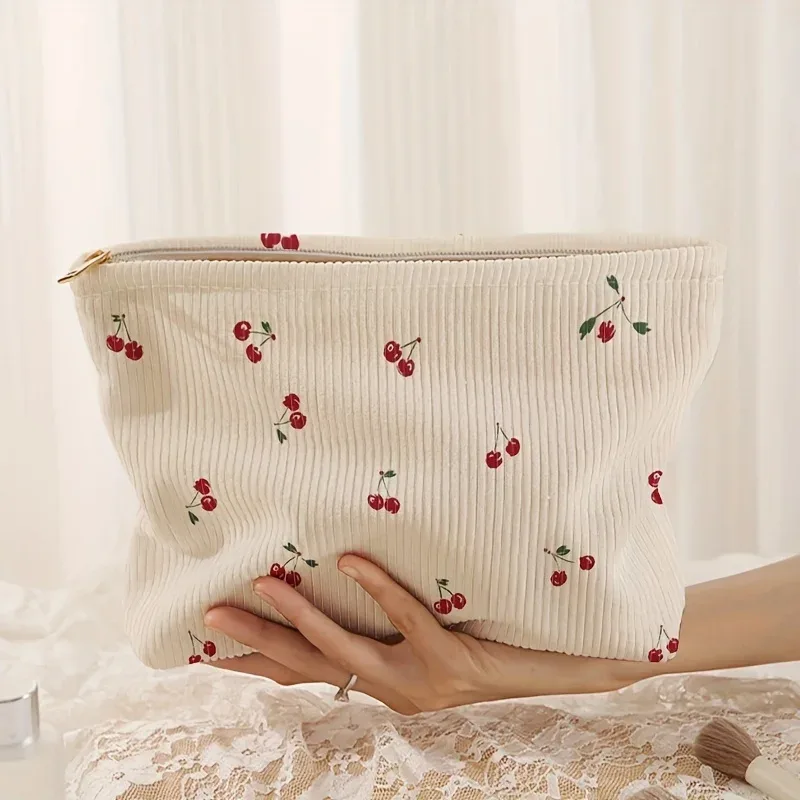 Trousse de maquillage en velours côtelé imprimé cerises, boîte de rangement légère à fermeture éclair, sac multifonctionnel avec doublure