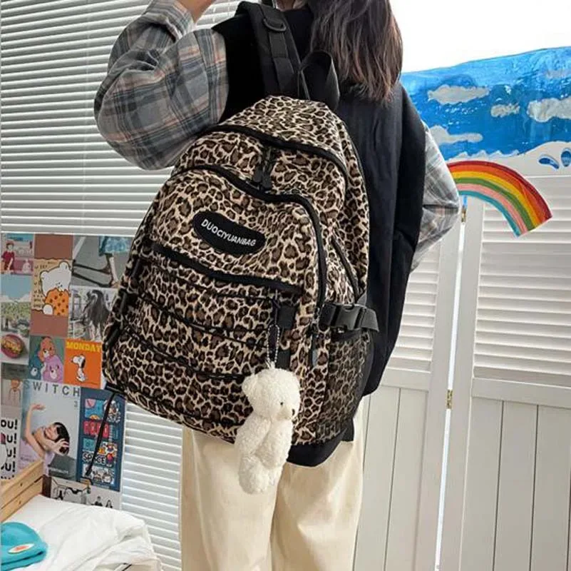 sac à dos de voyage imprimé léopard pour hommes et femmes, style européen, grande capacité, toile étanche, décontracté, double fermeture éclair, sacs à bandoulière, sac d'école