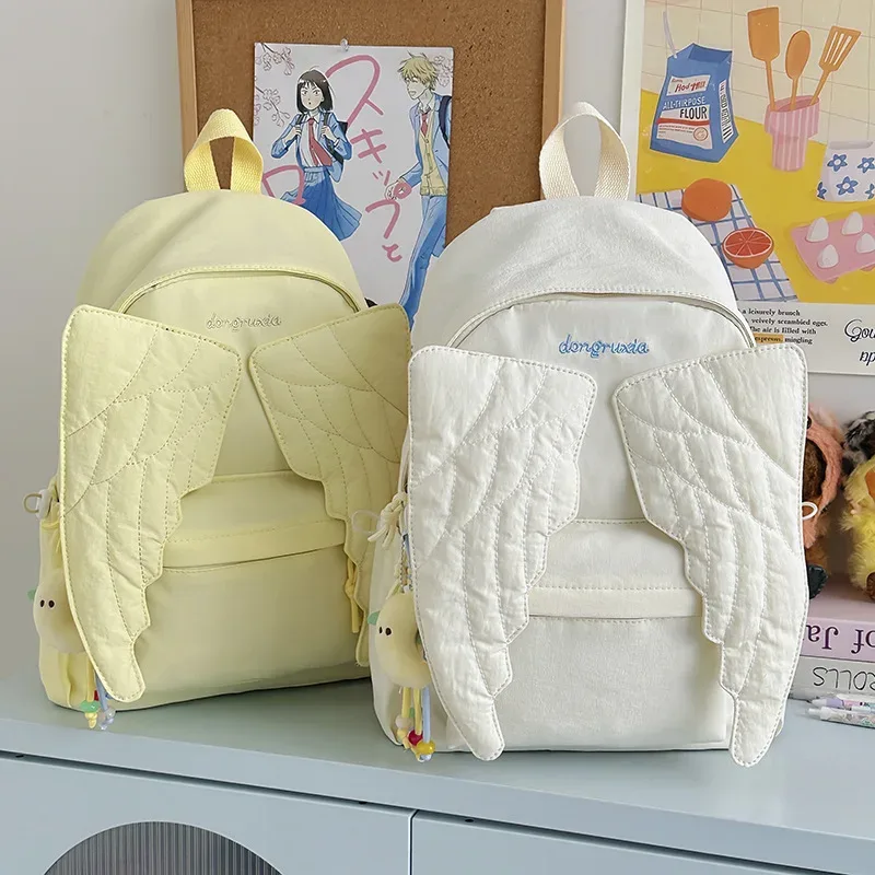 Sac à dos pour femmes avec ailes d'ange, sac à dos en toile polyvalent pour filles, sac de voyage d'extérieur de grande capacité