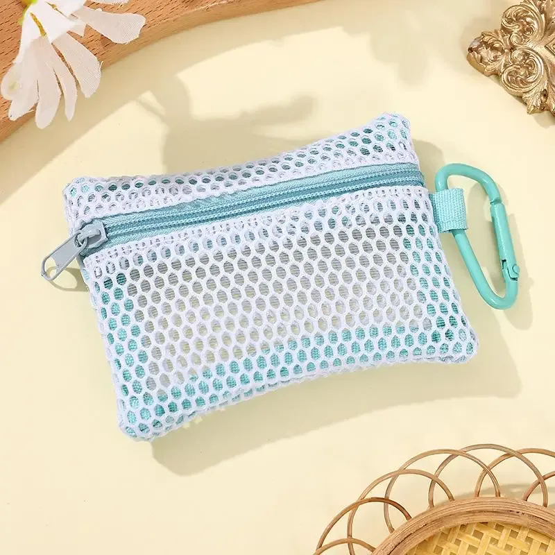 trousse de maquillage en maille transparente, pochette cosmétique portable élégante avec fermeture éclair, conception plate pour les articles de toilette et le rangement du maquillage