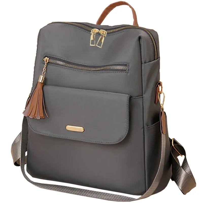 sac à dos chic et élégant multicolore avec détail pompon, sangle réglable, léger pour un usage quotidien, sac décontracté, fonctionnel et tendance