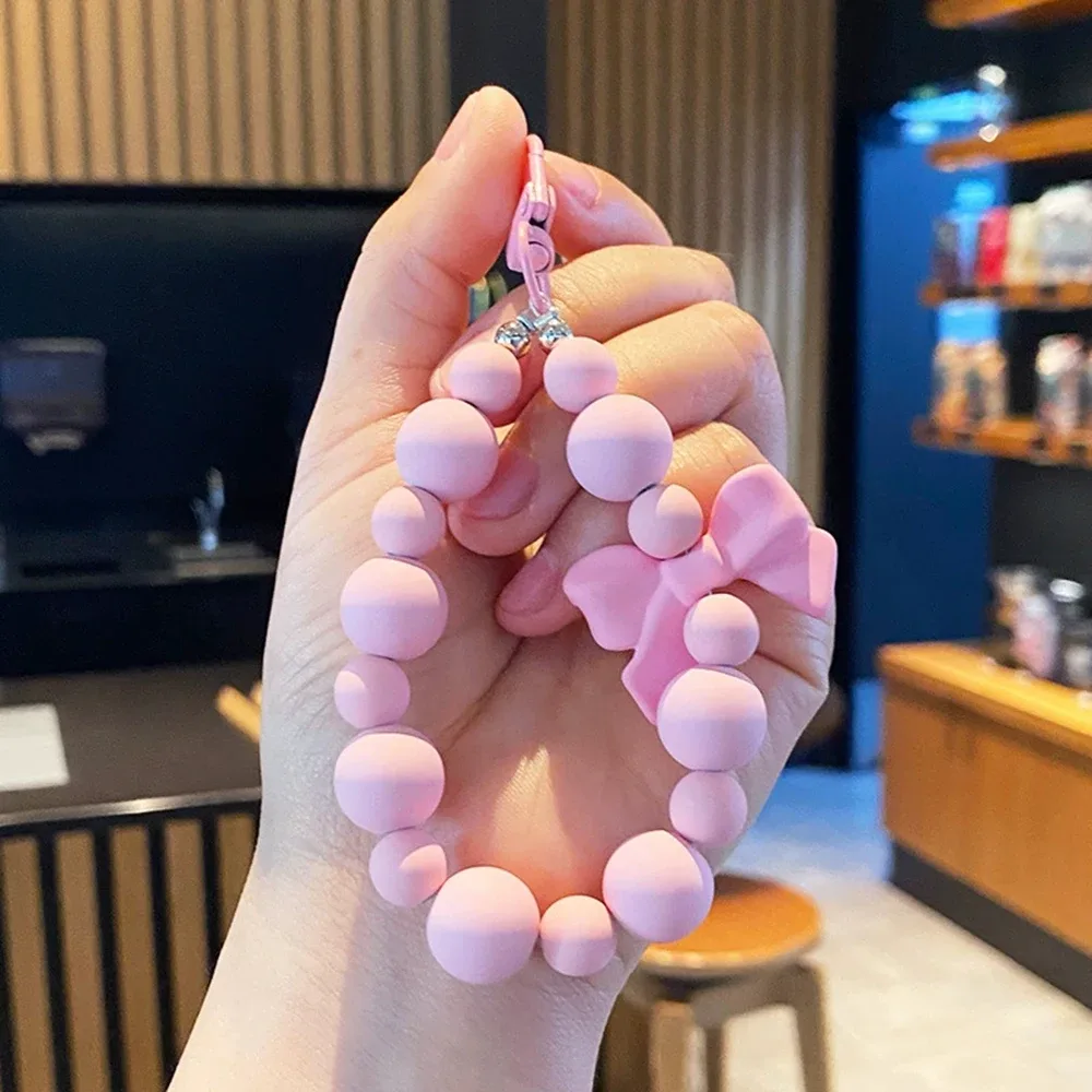 porte-clés avec nœud en perles roses, chaîne pour téléphone portable, sac pour écouteurs, corde anti-perte, porte-clés de voiture, pendentif perlé, accès au pendentif pour sac à dos