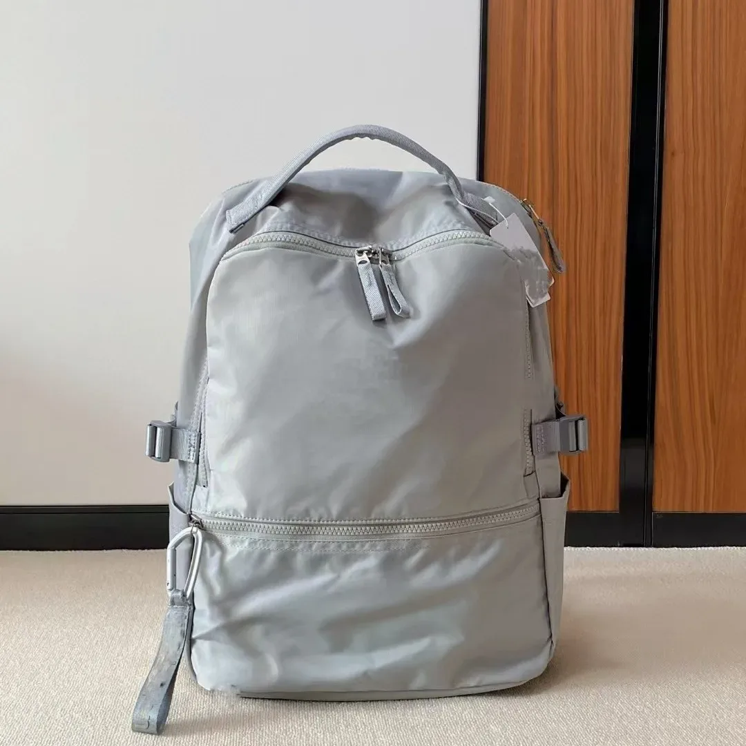 sac à dos minimaliste en nylon, sac à dos léger de grande capacité avec plusieurs compartiments pour les trajets quotidiens