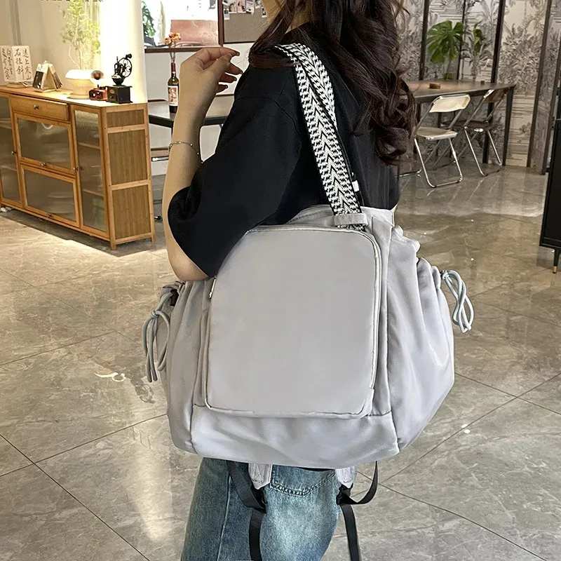 sac à dos imperméable résistant à l'usure, avec poches latérales à cordon de serrage, compartiment de rangement, sac d'extérieur