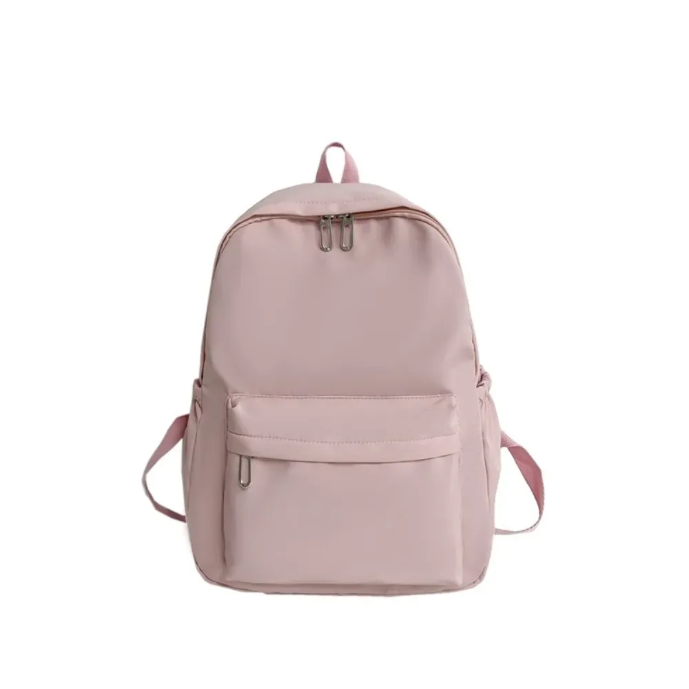 Sac à dos de style coréen au design minimaliste, couleur unie, en nylon imperméable, grande capacité, avec bretelles rembourrées, style simple.