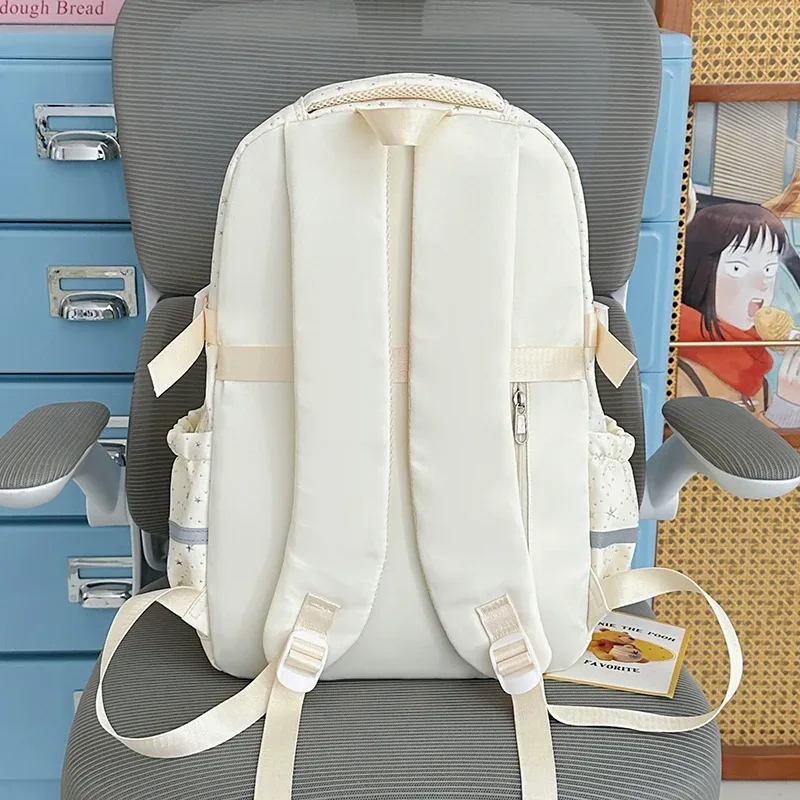 sac à dos pour femmes, sac de voyage multi-poches, joli sac d'école à rayures réfléchissantes avec nœud et étoiles pour adolescentes, sac à livres
