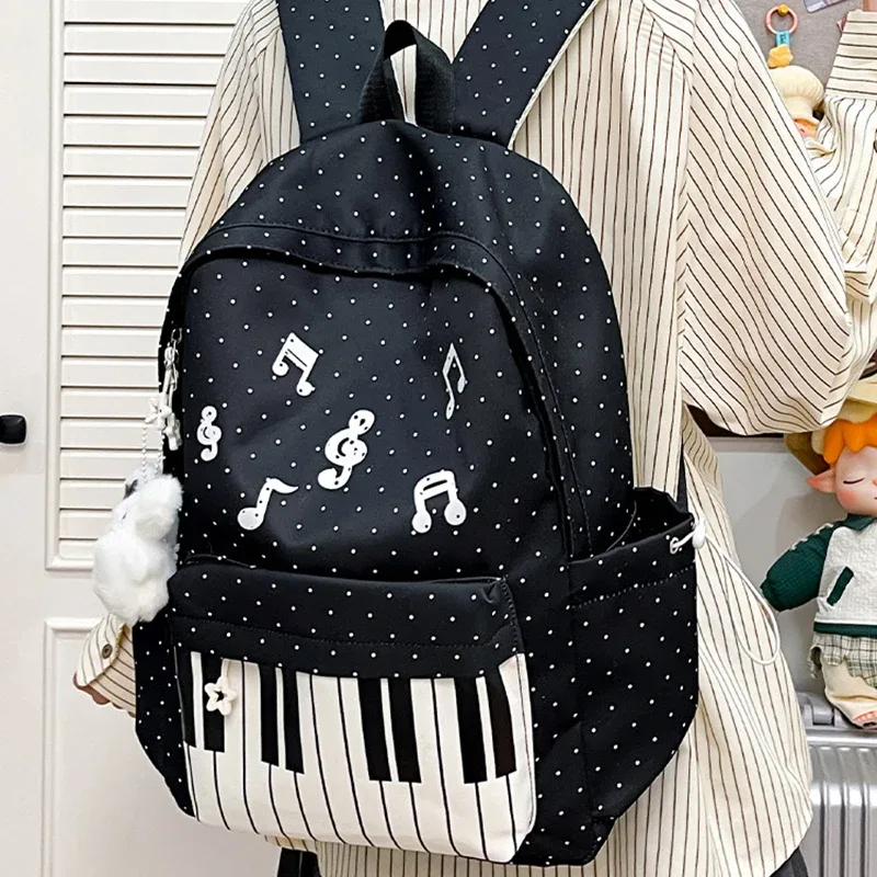 sac à dos ailes d'ange de marque pour filles, niche douce et polyvalente, en toile, nouveau sac de voyage tendance y2k avec pompon, grande capacité