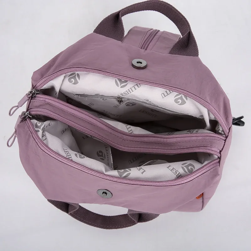 sac à dos léger et résistant à l'eau pour femmes, en tissu oxford durable, organisateur multi-poches pour les trajets quotidiens, les étudiants et les voyages