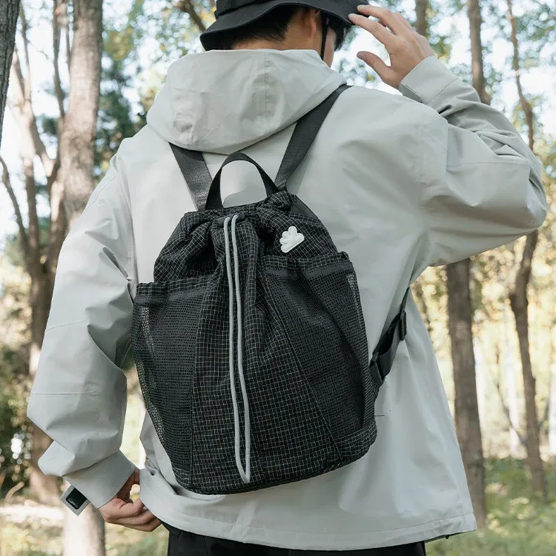 Sac à dos minimaliste de couleur unie, léger, pour la randonnée, grande capacité, fermeture à cordon, sac à bandoulière, décontracté, pour les trajets quotidiens