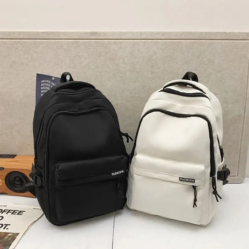 Sac à dos de grande capacité de couleur unie, sac noir simple pour étudiants et voyages