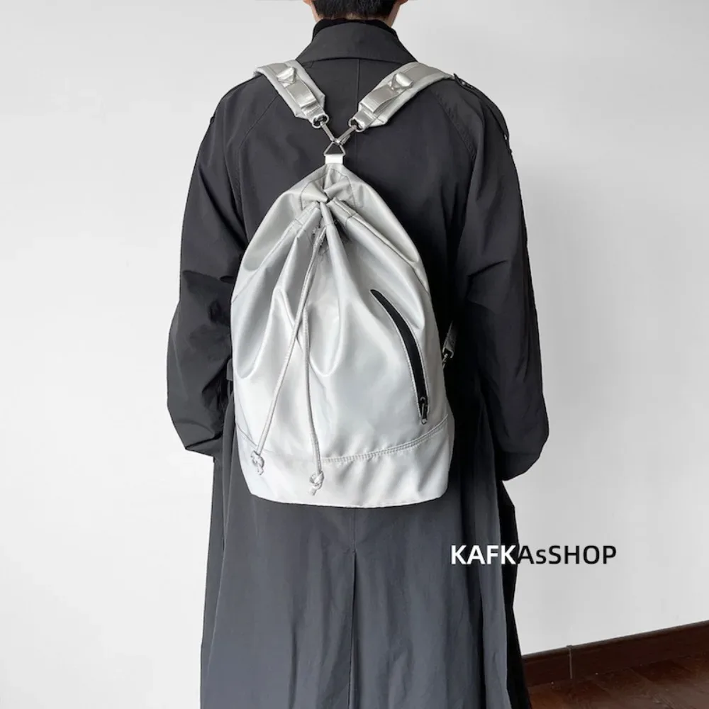 sac à dos seau tendance coréen de style neutre, double usage, sac à bandoulière, texture premium, grande capacité, sac à dos unisexe pour la journée